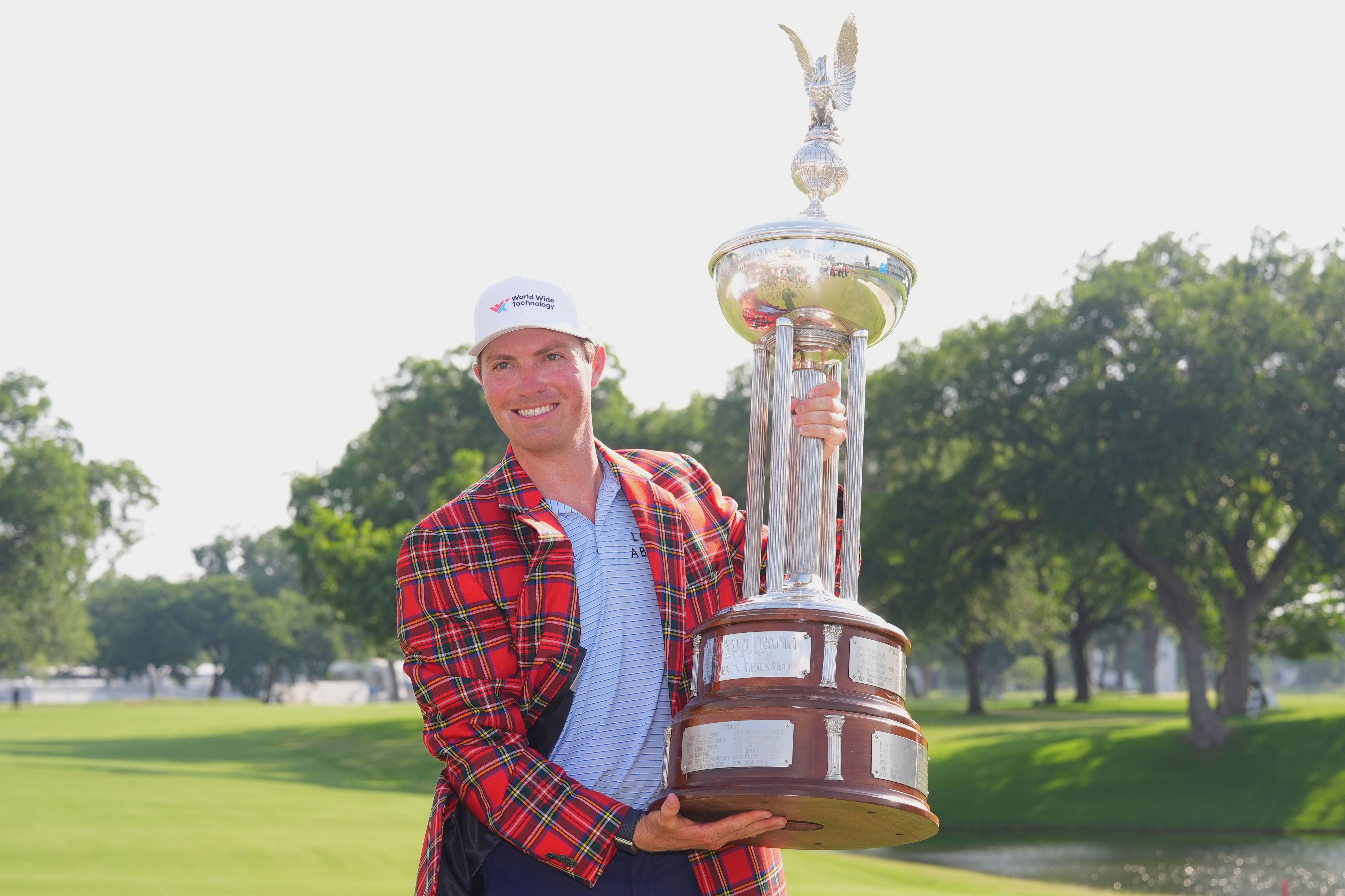 Ben Griffin celebrates after winning the Charles Schwab Challenge golf tournament at Colonial Country Club in Fort Worth, Texas (AP Photo/LM Otero)
