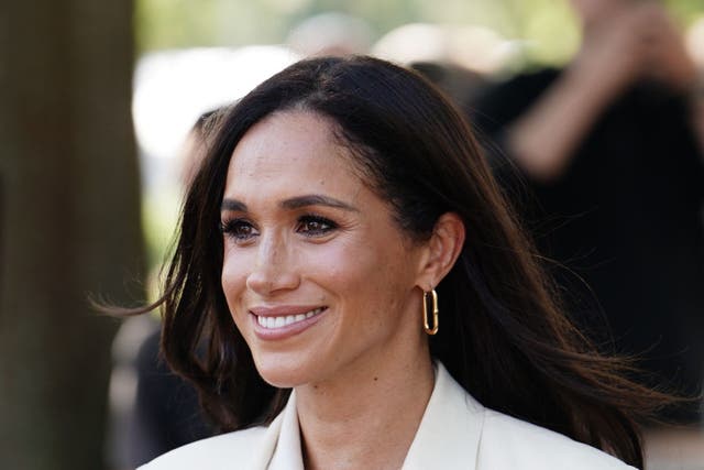 The Duchess of Sussex shared shared a clip of her and her daughter beekeeping (Jordan Pettitt/PA)