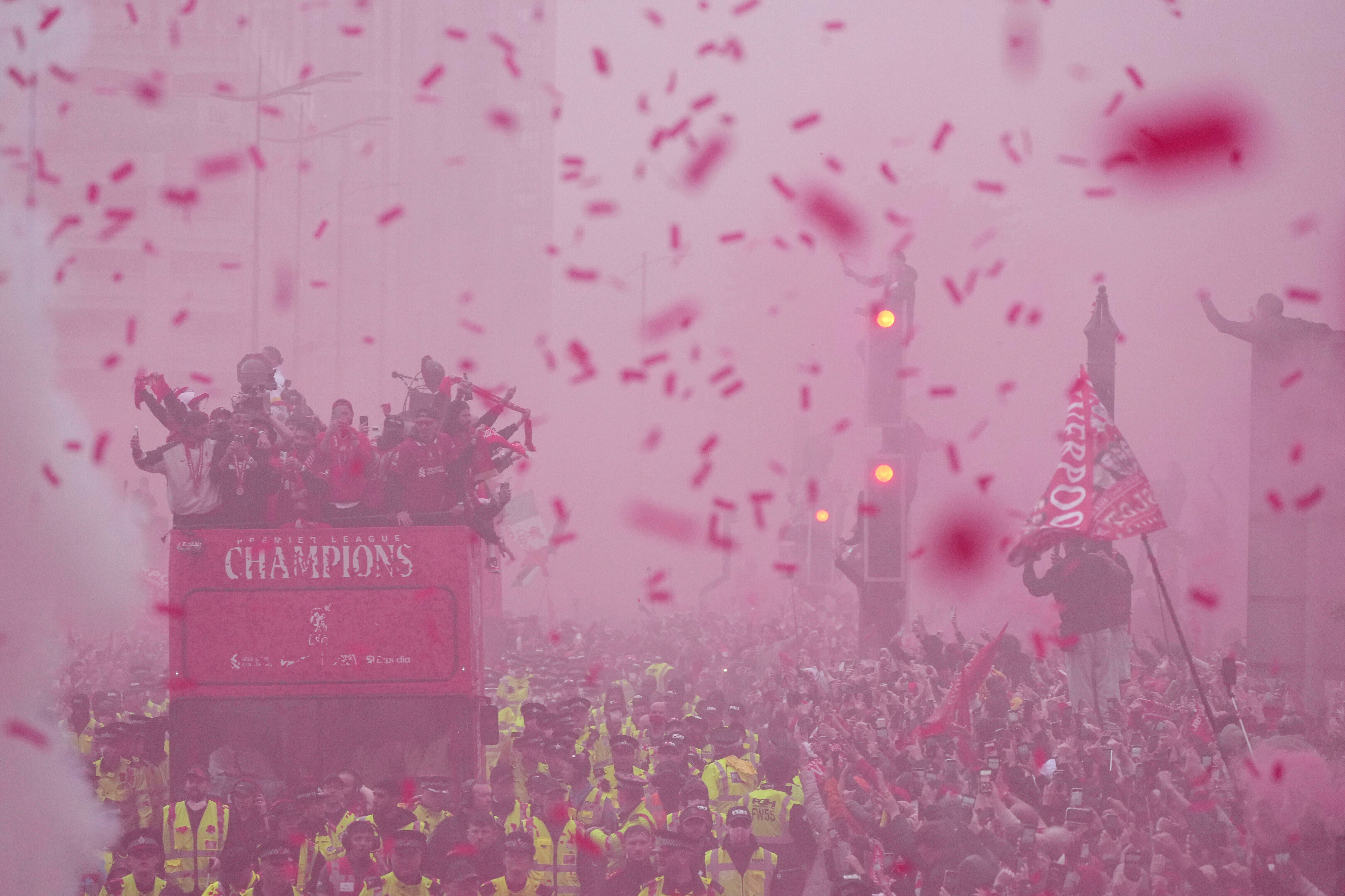 Liverpool players celebrated with the trophy on an open-top bus during the Liverpool FC victory parade