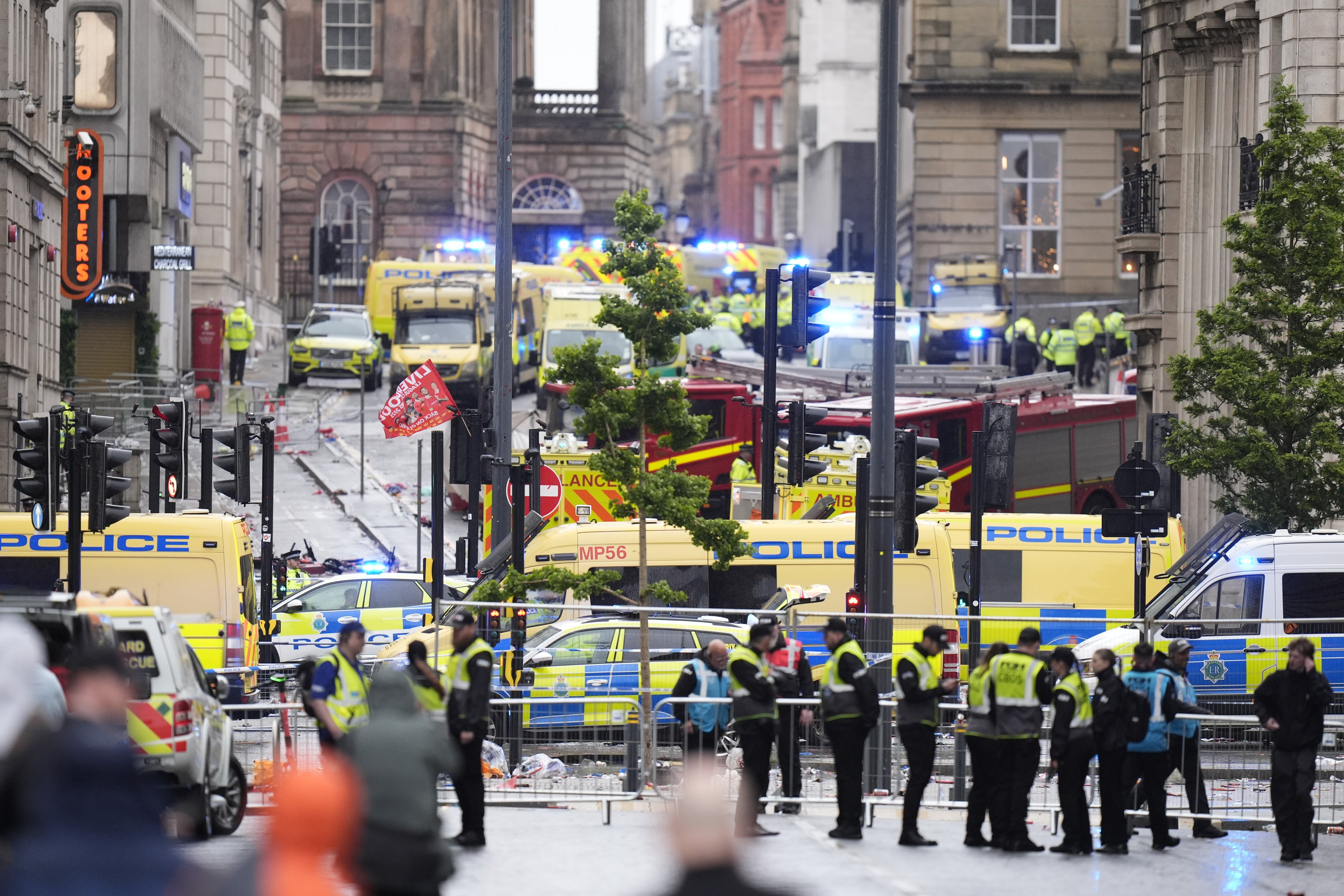 Four children among injured after car ploughs into Liverpool parade ...