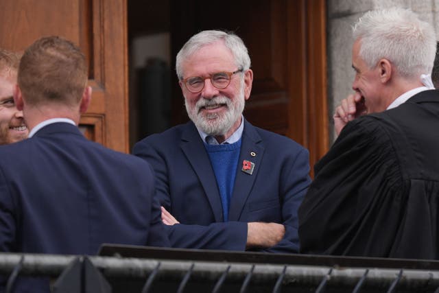Former Sinn Fein president Gerry Adams (centre) outside the High Court in Dublin, where he is bringing a legal action against the BBC over allegations about the murder of an MI5 spy (Niall Carson/PA)