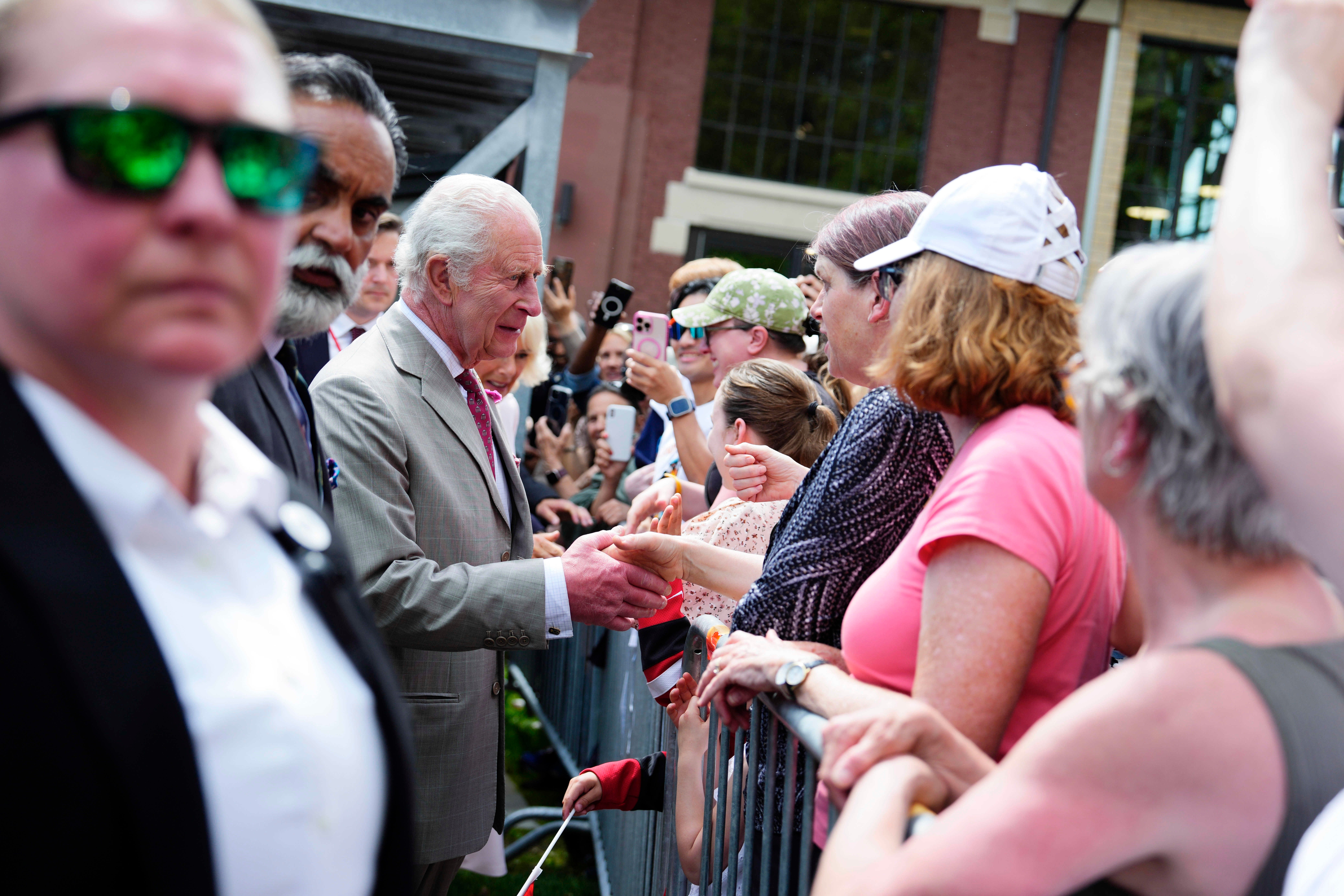 Charles greets members of the public during a visit to Lansdowne Park in Ottawa, Canada