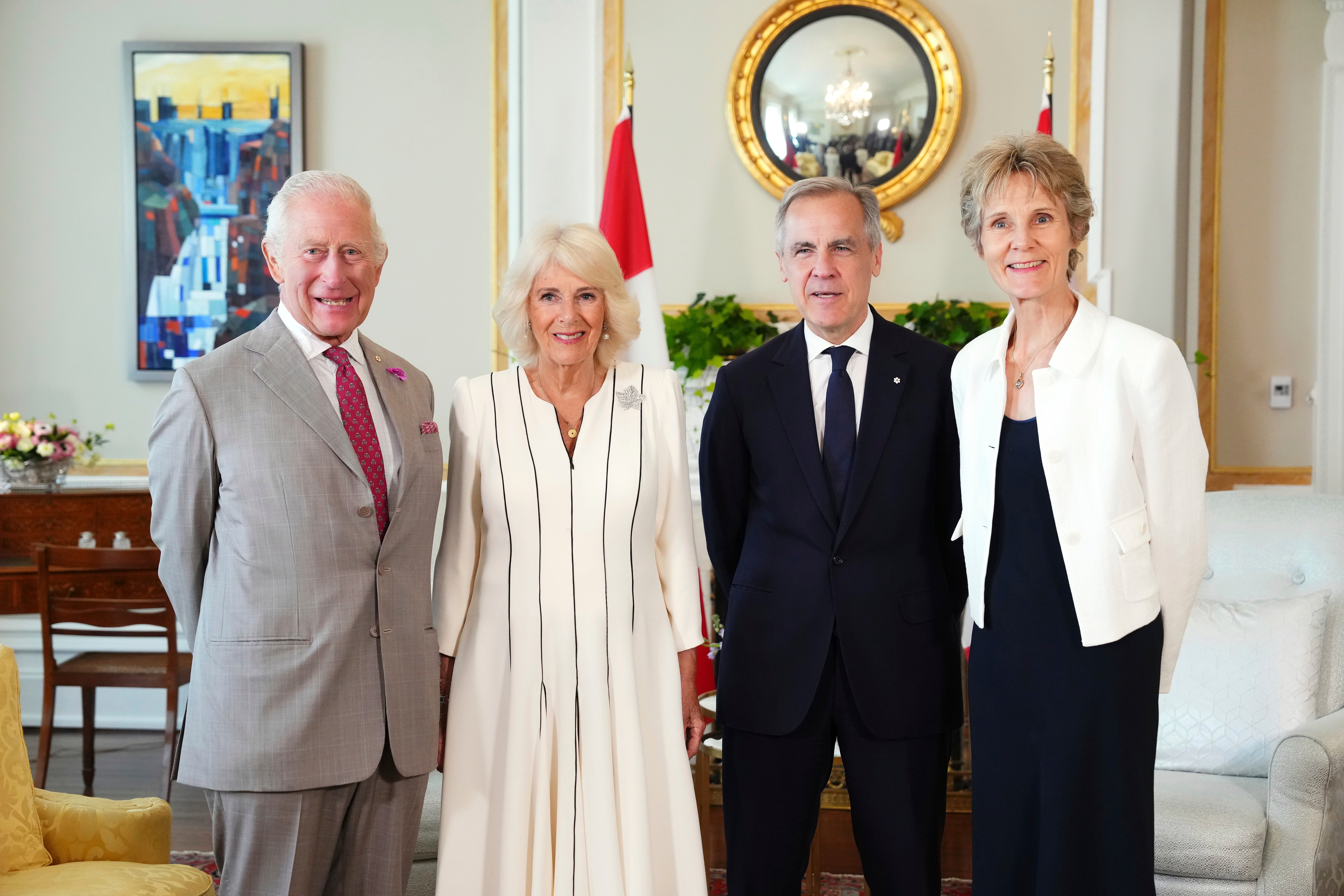 From left, Britain’s King Charles, Queen Camilla, Canada’s prime minister Mark Carney and his wife Diana Fox Carney pose for a family portrait at Rideau Hall