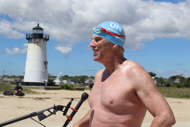 Lewis Pugh has completed his 12-day swim around Martha’s Vineyard, calling for shark protection (Leah Willingham/AP)