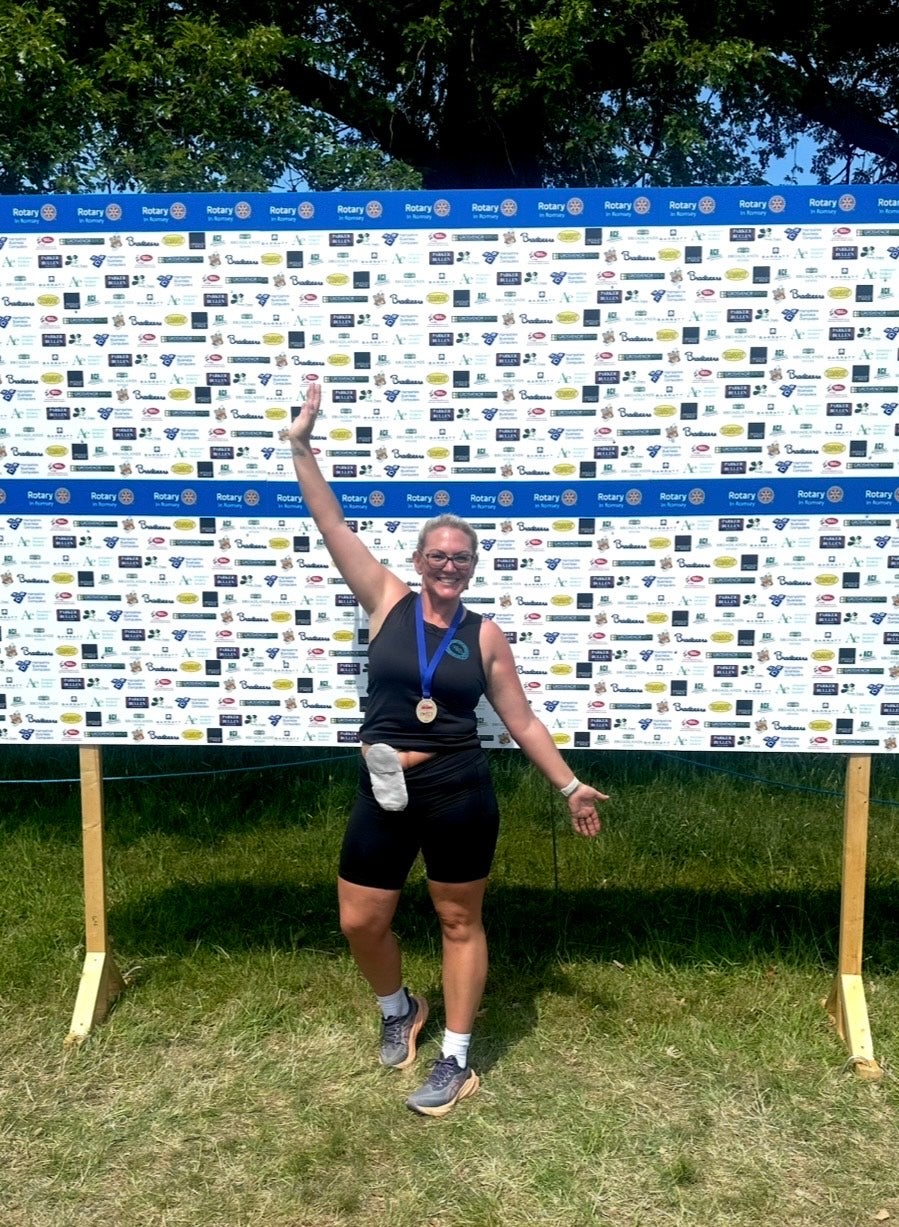 Lindsay with stoma bag after her first relay marathon in Romsey