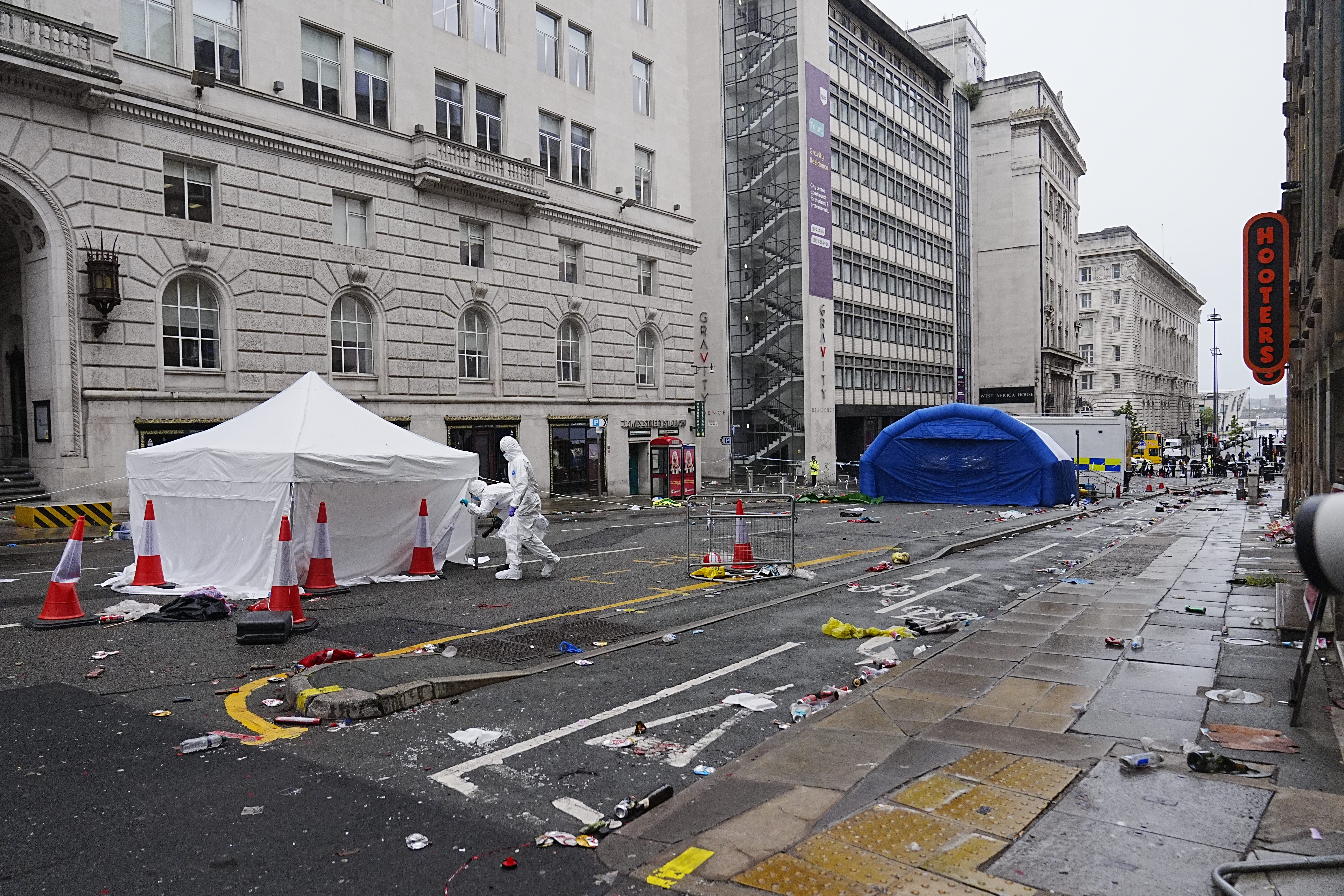 Forensic officer at the scene in Water Street