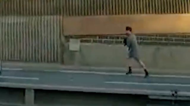 <p>Dramatic moment police chase suspect down dual carriageway on foot</p>