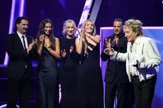 Rod Stewart swears live at AMAs as children make surprise joint appearance