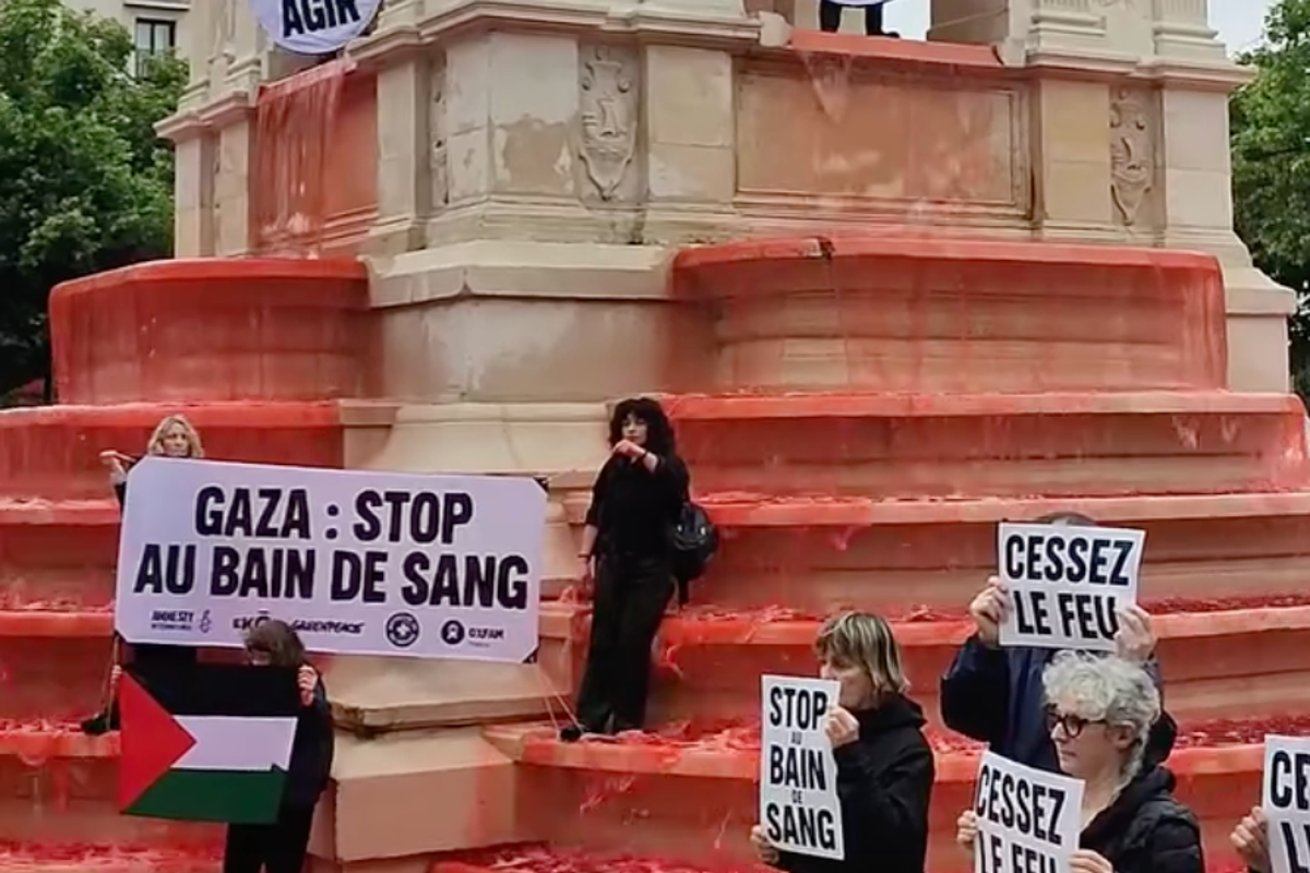 Blood-red water pours down Paris fountain in pro-Palestine protest