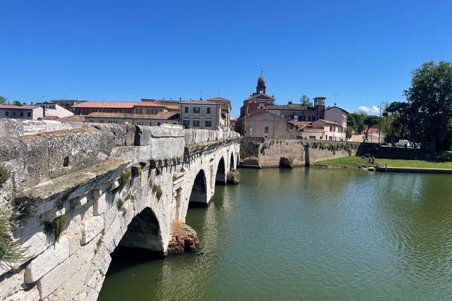 <p>A view over the river in Rimini, Italy. (PA)</p>