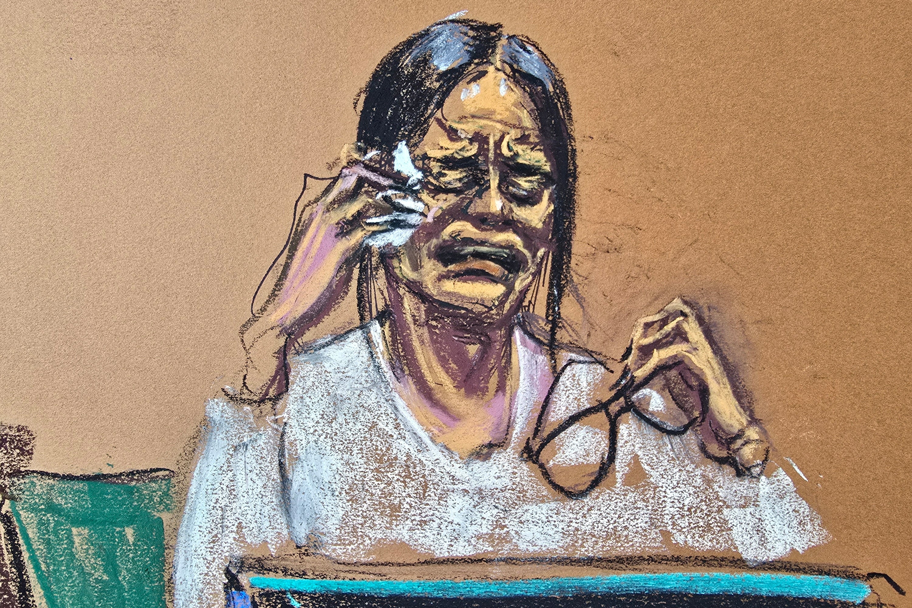 Capricorn Clark reacts during testimony