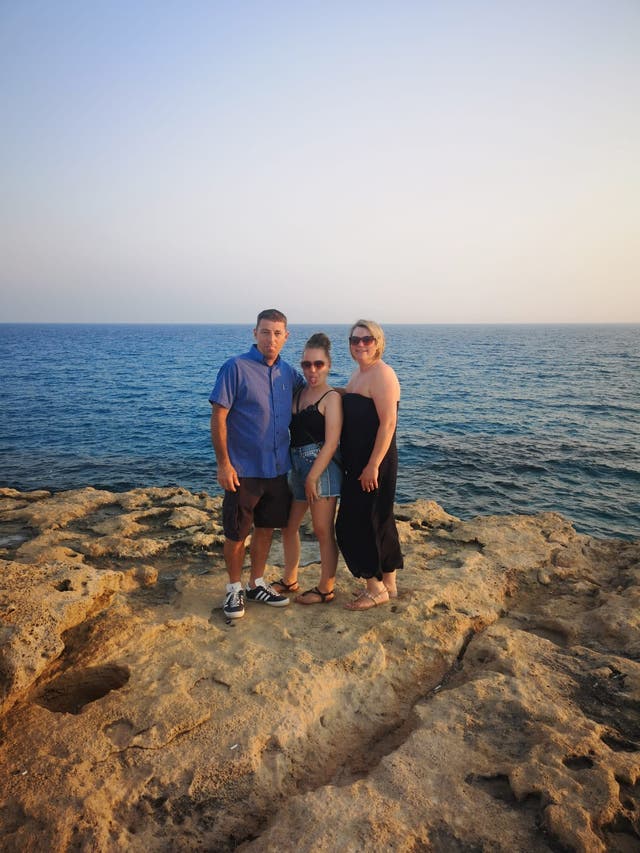 <p>Lily on holiday in Cyprus with her parents</p>