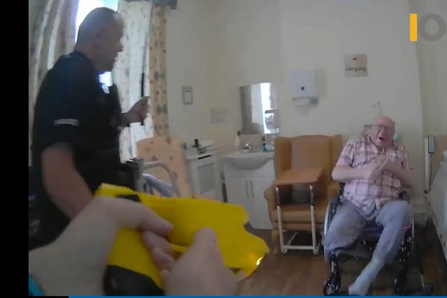 Handout screengrab from body worn video issued by Independent Office for Police Conduct (IOPC) of the incident when Donald Burgess was sprayed in the face with synthetic pepper spray before being shot by a Taser and hit with a baton, by police officers responding to a call at his care home. The one-legged 93-year-old was allegedly assaulted by Pc Stephen Smith and Pc Rachel Comotto, at the home in St Leonards-on-Sea, East Sussex, on June 21 2022. At a trial at London’s Southwark Crown Court, Smith, 51, denies two counts of assault by using Pava spray and a baton, and Comotto denies one charge of assault by discharging her Taser.