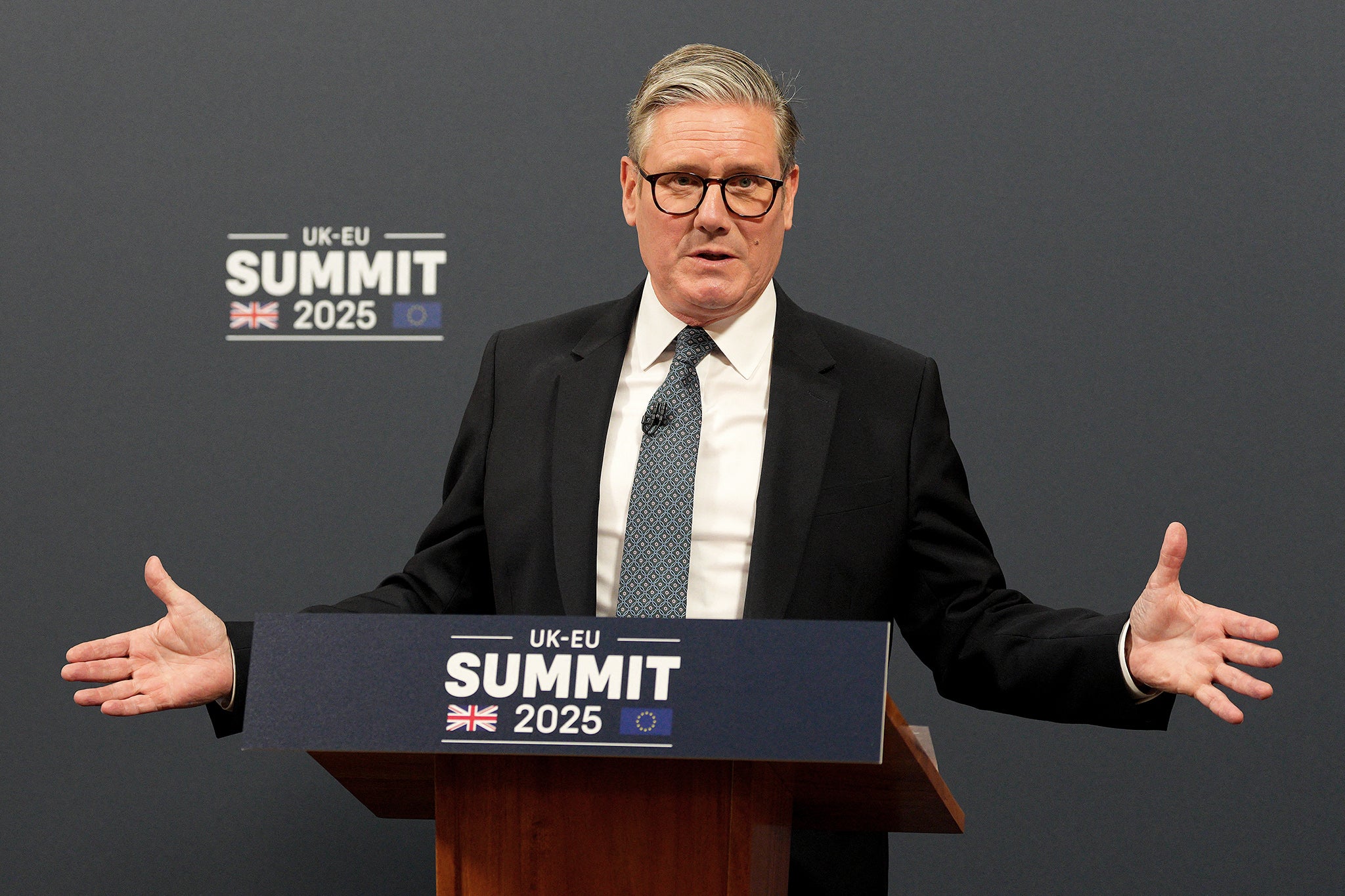 <p>Britain's Prime Minister Keir Starmer gestures during a joint press conference during the UK-EU Summit at Lancaster House in London on May 19, 2025. British Prime Minister Keir Starmer described a landmark deal setting out closer ties on defence and trade with the European Union as a "win-win" on Monday. (Photo by Carl Court / POOL / AFP) (Photo by CARL COURT/POOL/AFP via Getty Images)</p>