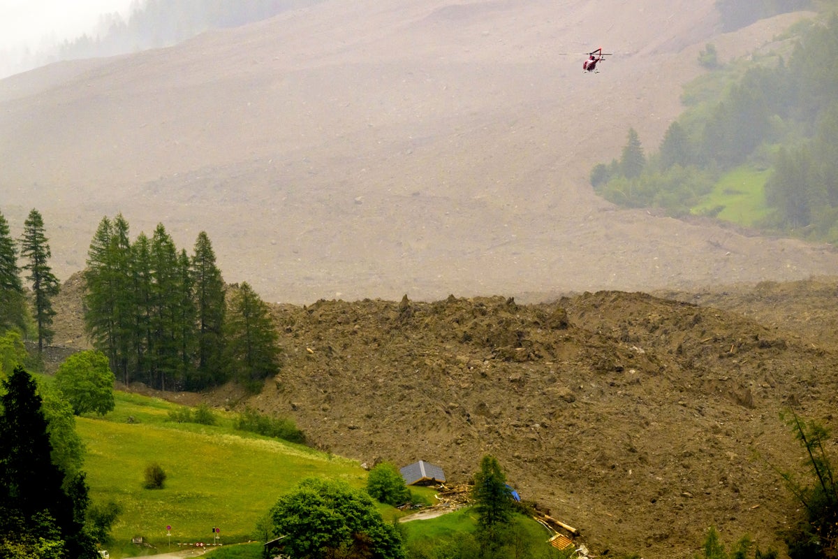Army searches for man after huge chunk of glacier crushes picturesque Swiss Alpine village