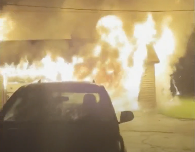 <p>A garage fire in upstate New York on May 17. A group of teens from Whitesboro High School spotted the fire after leaving their junior prom and helped call emergency services and alerted the family living at the property to the fire, potentially saving their lives</p>