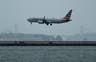Shirtless traveler tackles, pins crew member as flight is turned back