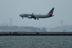 Shirtless American Airlines passenger tackles, pins crew member as flight to Chicago is thrown off course
