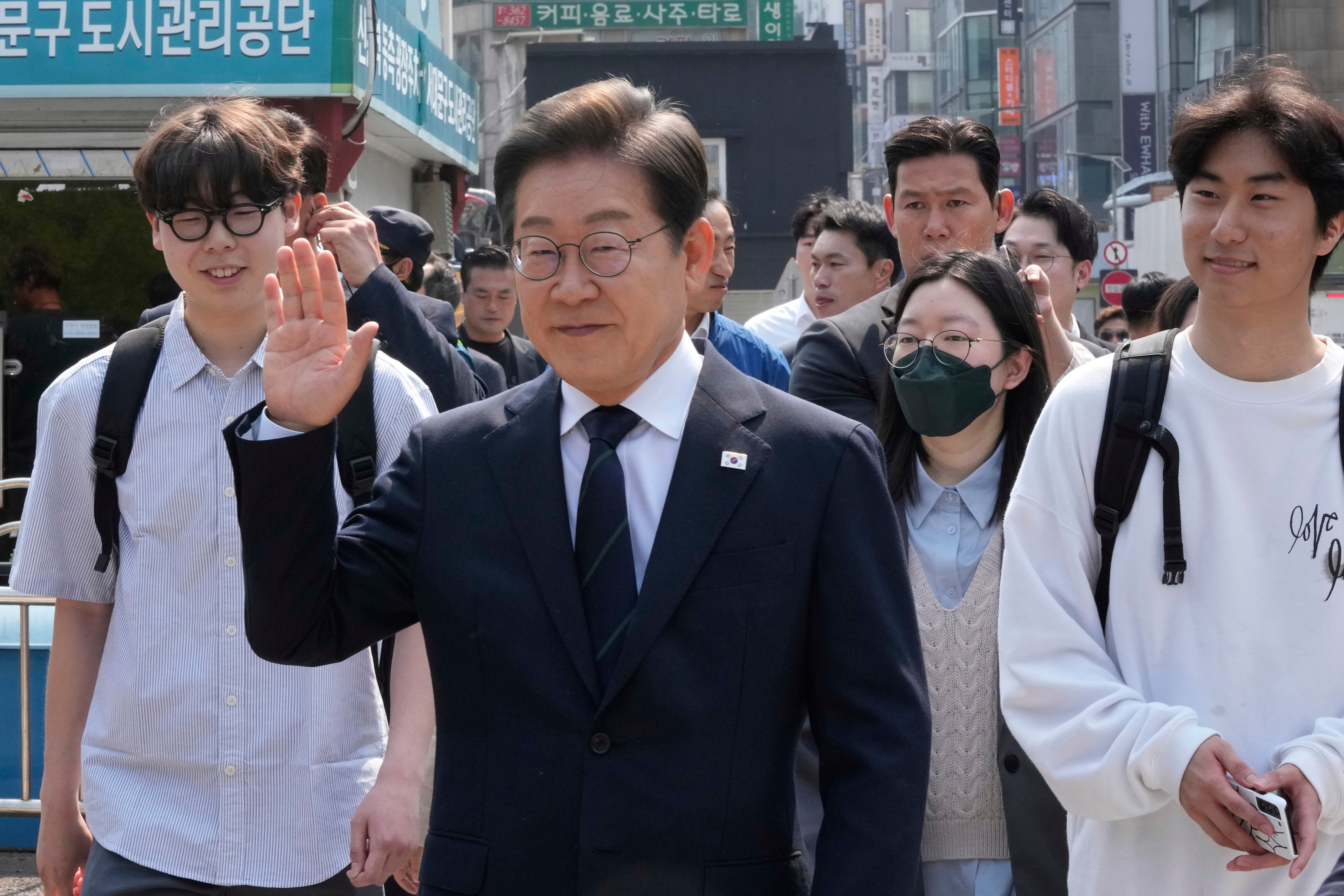 Lee Jae-myung, centre, is the favourite to win the election