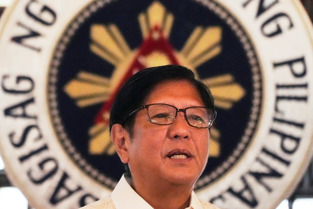 Philippine president's Cabinet revamp retains defense chief, a vocal critic of China's aggression