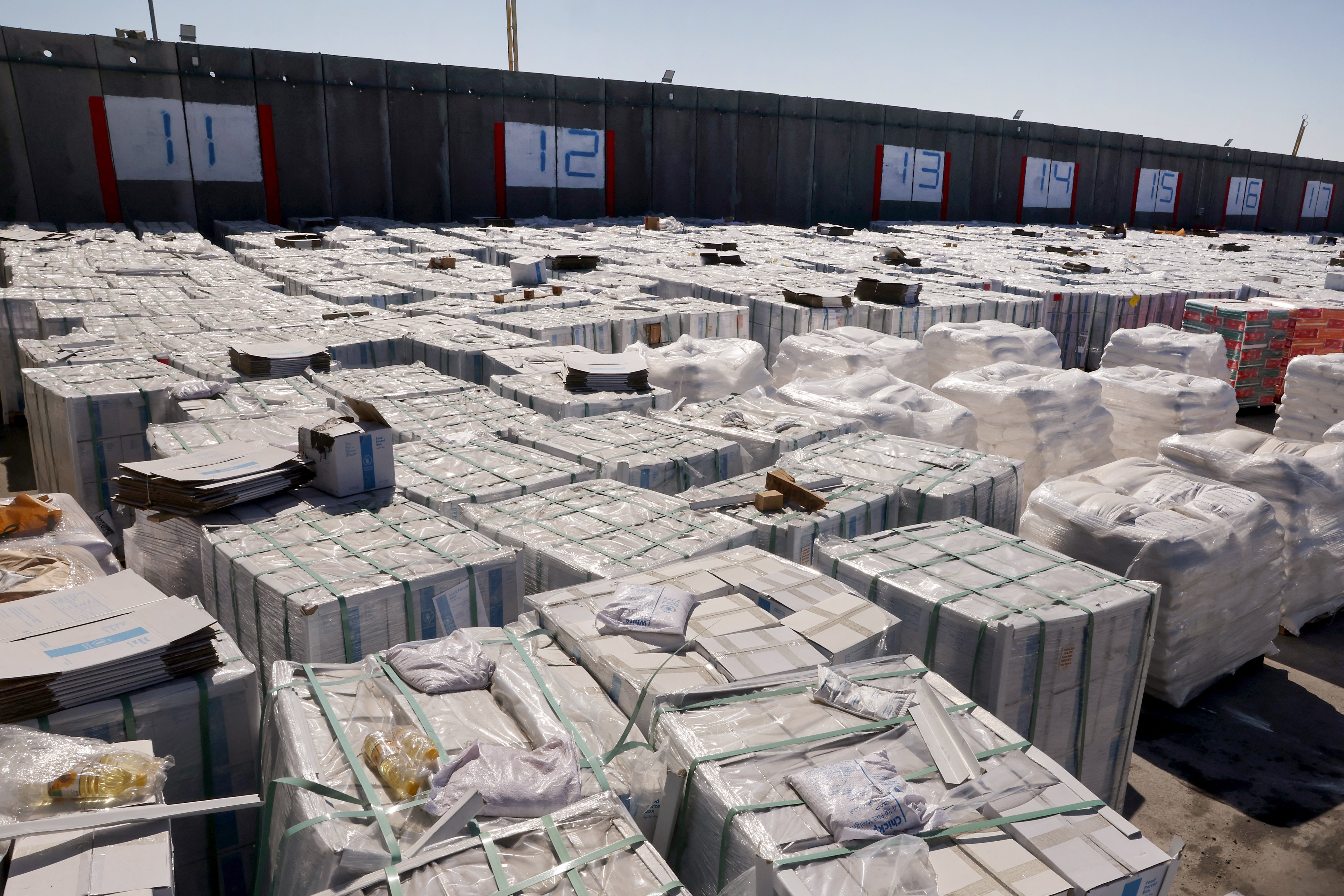 Humanitarian aid wait destined to Gaza wait at the Kerem Shalom crossing between southern Israel and the Gaza Strip, on May 29, 2025, amid the ongoing war between Israel and Hamas