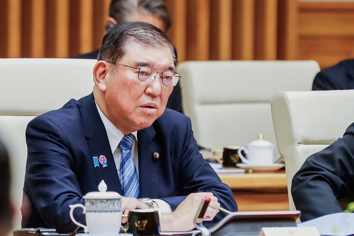 Japan's Ishiba warns against tension over tariffs and vows to expand Asia-Pacific trade group
