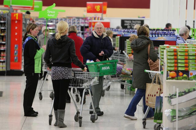 Shoppers at an Asda supermarket (Dave Thompson/PA)