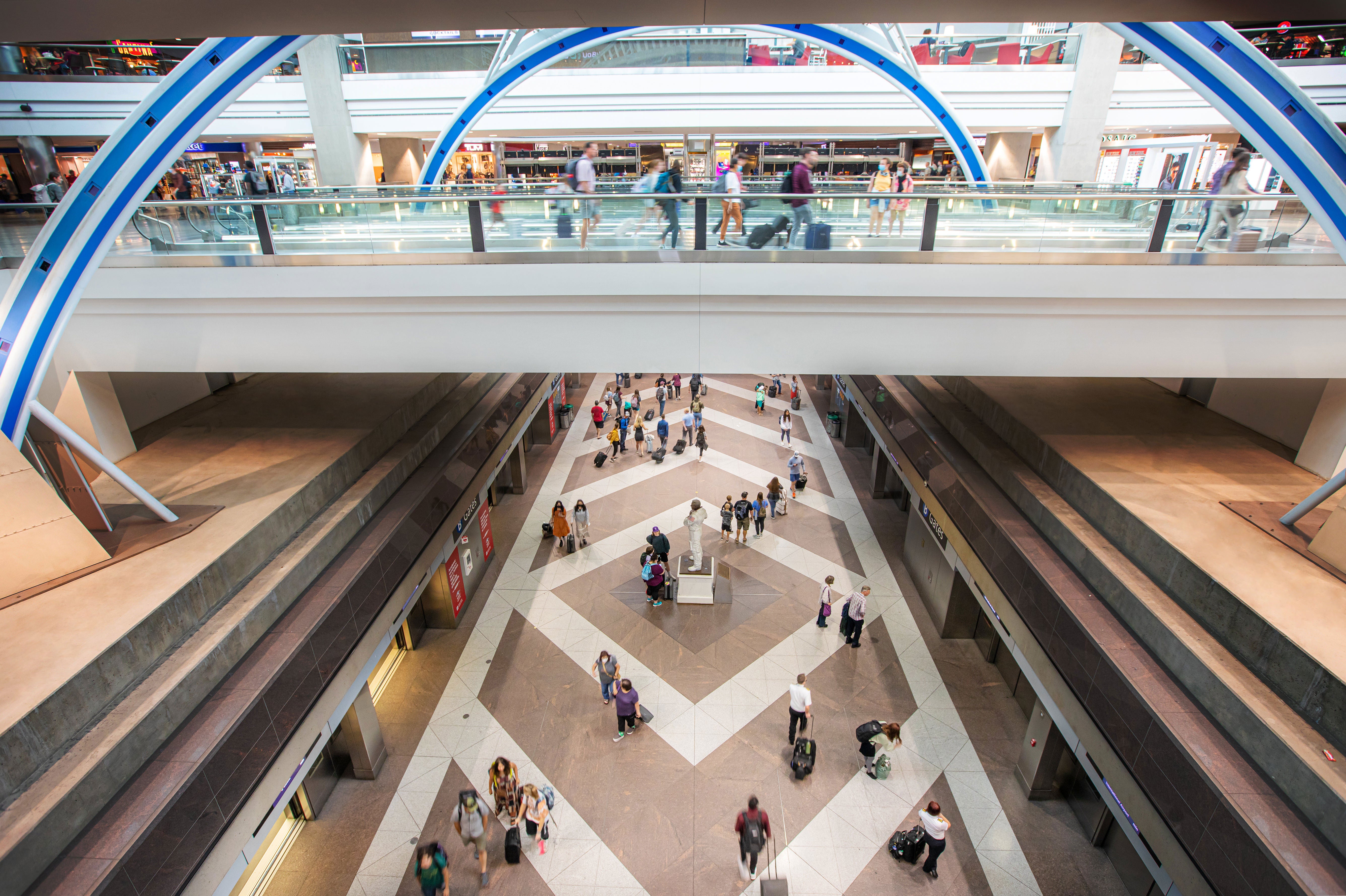 Denver Airport is the biggest airport in the US at 54 square miles. Above is Concourse B