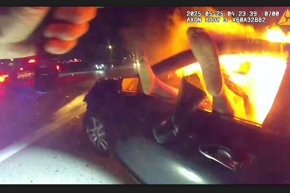Officer rescues woman from burning car in aftermath of interstate crash in Phoenix