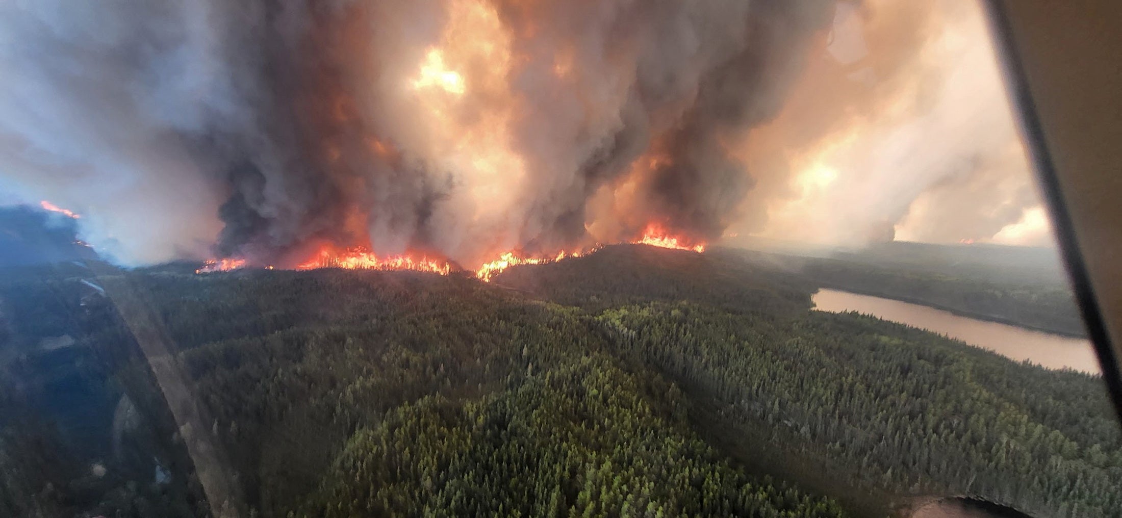 Smoke rises from wildfires in Flynn Flynn, Manitoba, Canada
