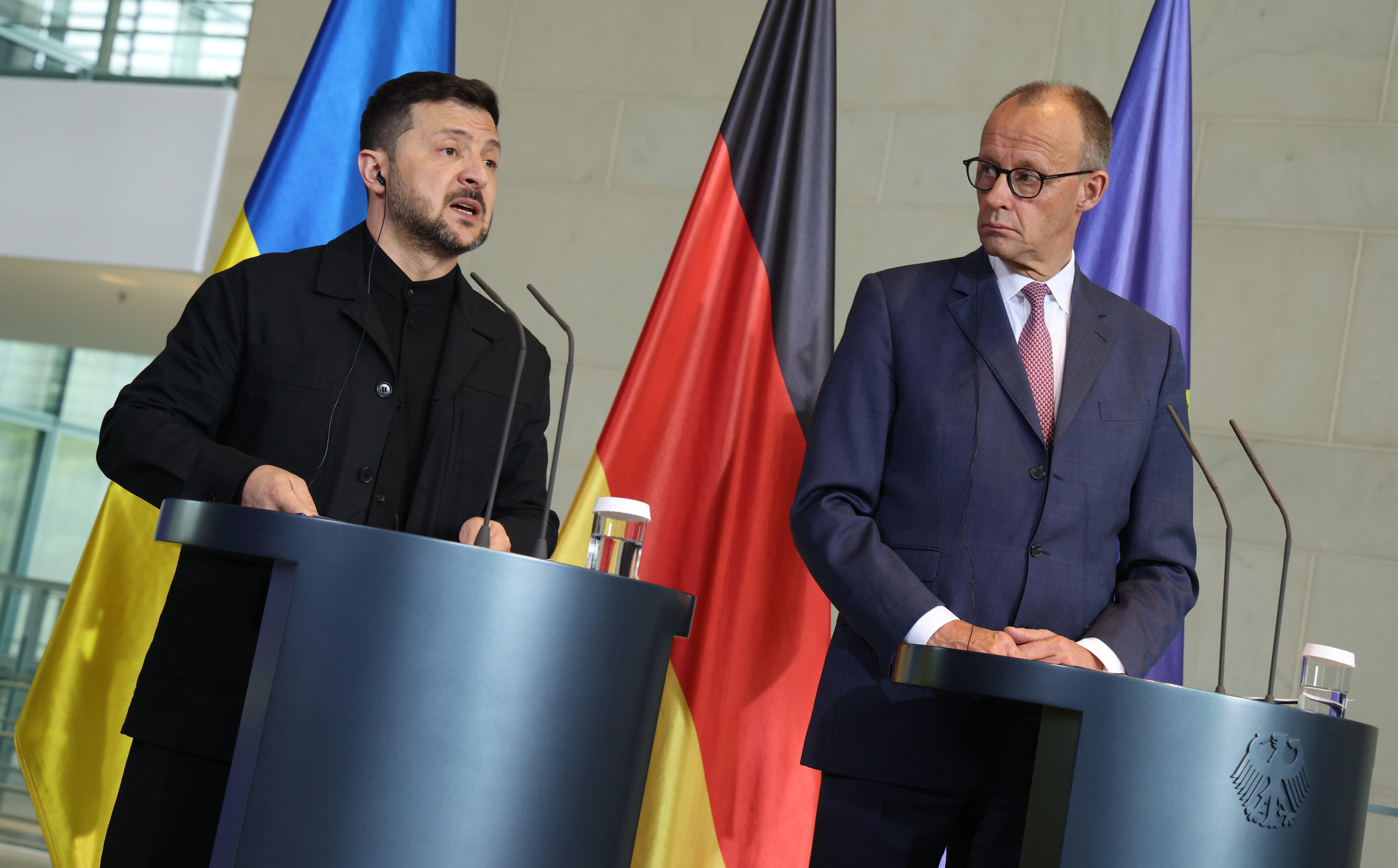 German chancellor Friedrich Merz and Ukrainian President Volodymyr Zelensky speak to the media following talks at the Chancellery