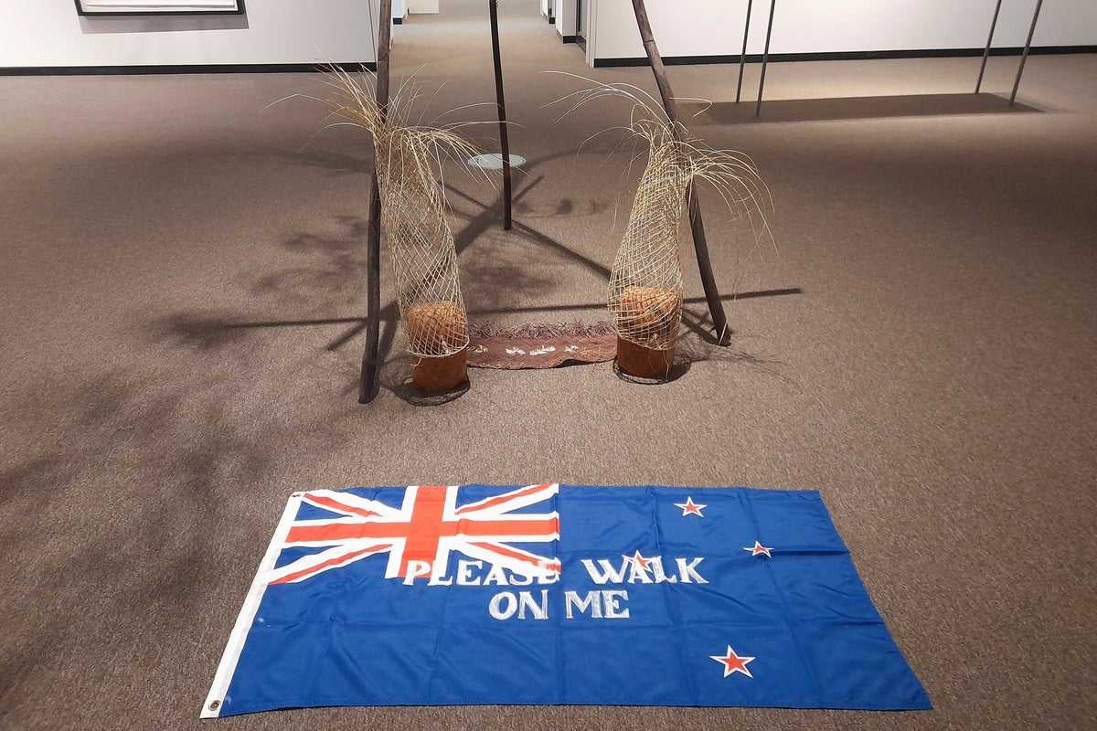 Protests over ‘please walk on me’ flag artwork prompt its removal from New Zealand gallery — again