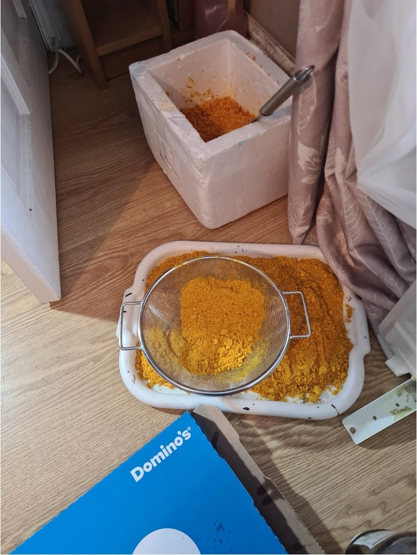 Police found a large amount of orange powder in his house