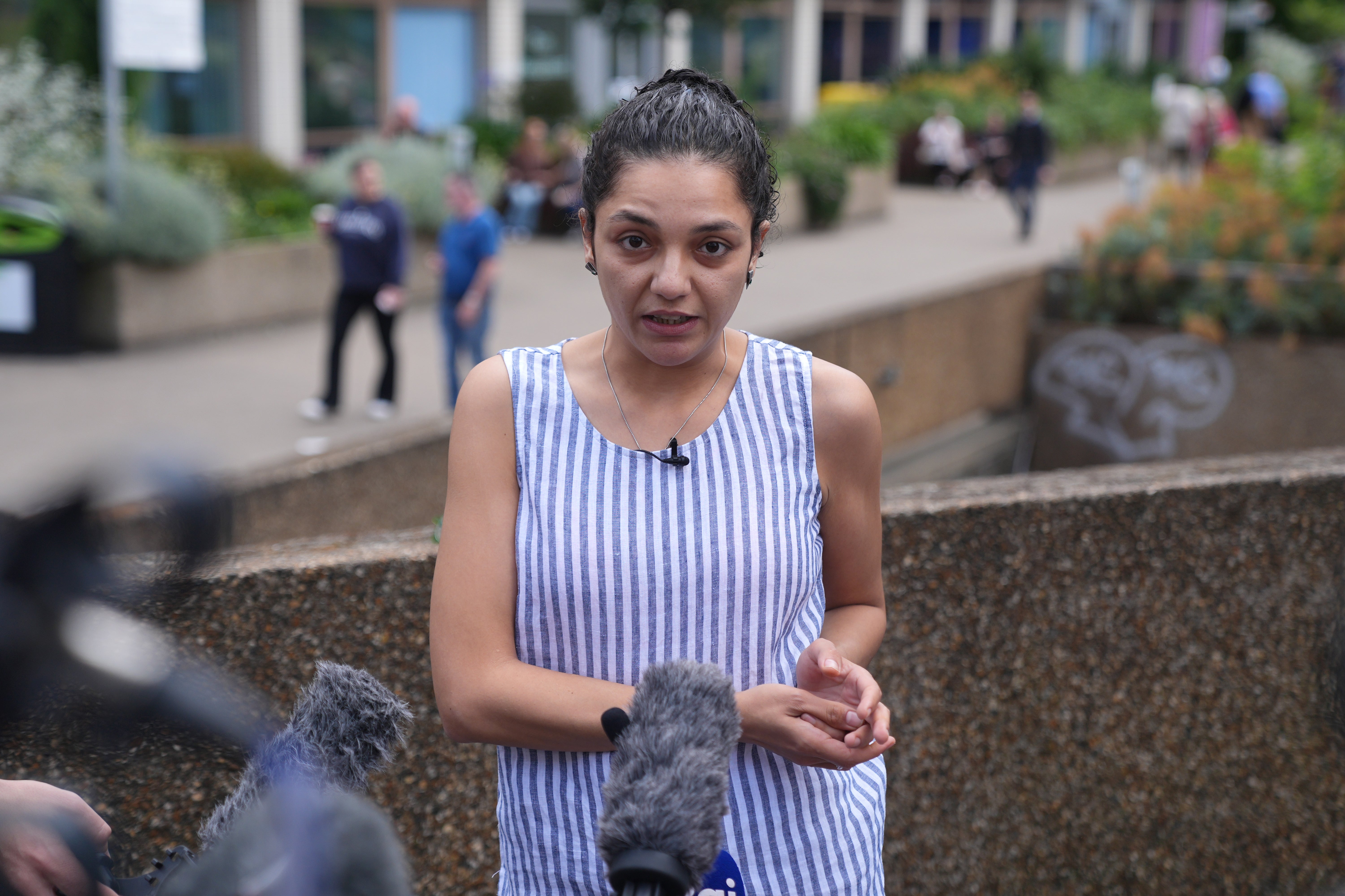 Sanaa Seif, 31, speaks to the media outside St Thomas’ Hospital