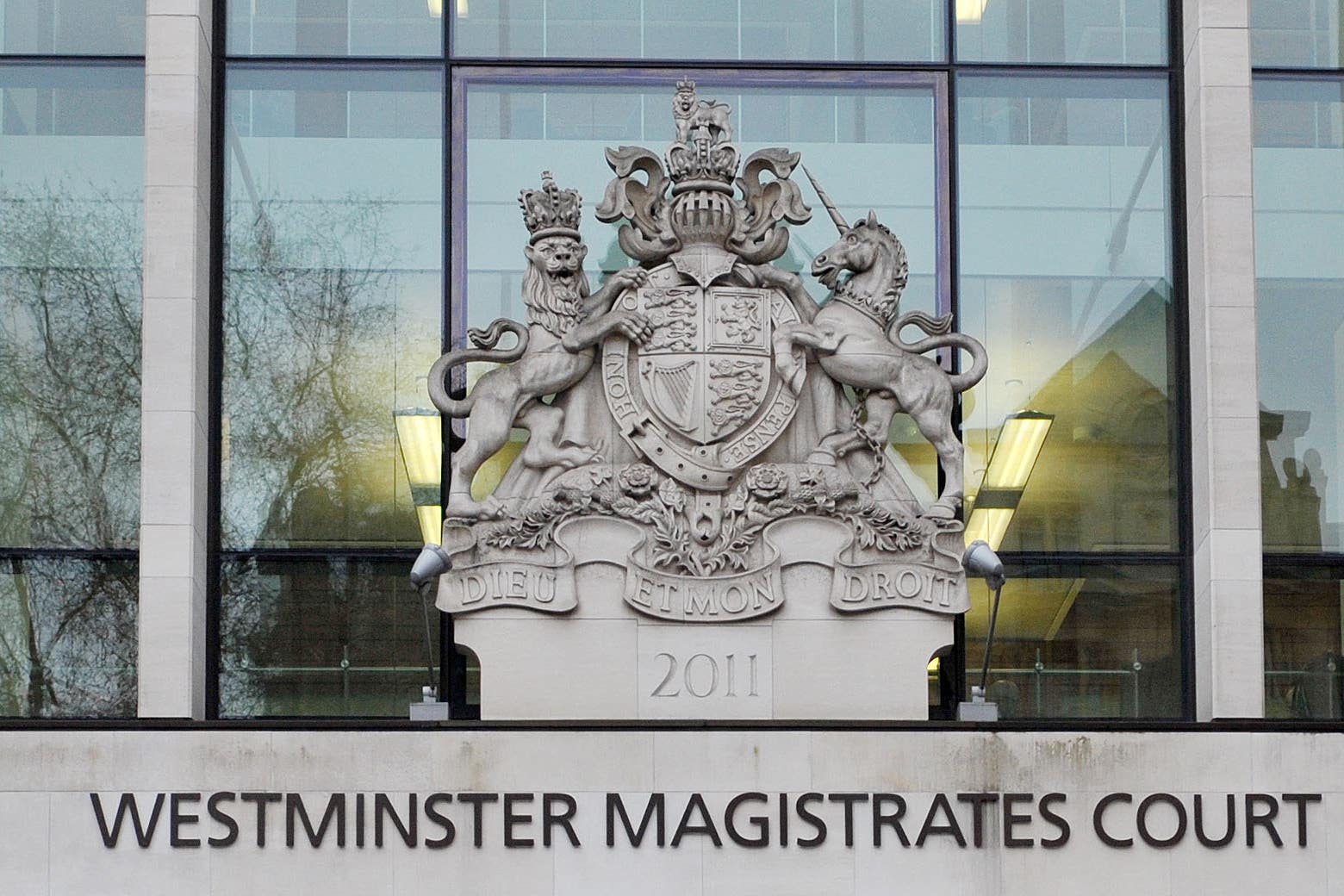 Reginald D Hunter is charged with three counts of sending an offensive communication (Nick Ansell/PA)