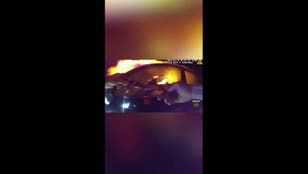 Terrifying footage shows hero cop rescuing woman from blazing car