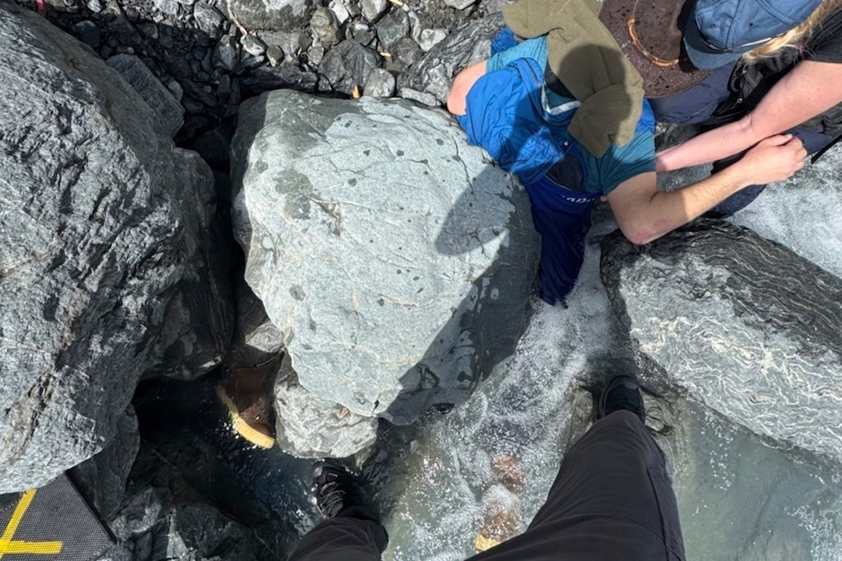 Man trapped for three-hours under boulder sustains only minor injuries