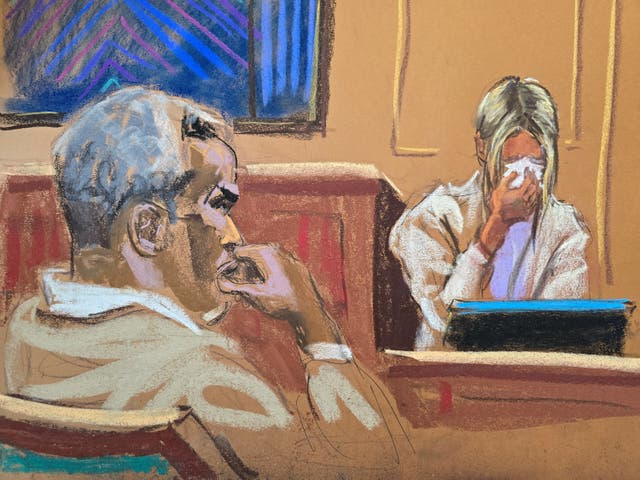 <p>Sean "Diddy" Combs watches as witness "Mia" testifies in Combs' sex trafficking trial in New York City, New York, U.S., May 29, 2025 in this courtroom sketch</p>