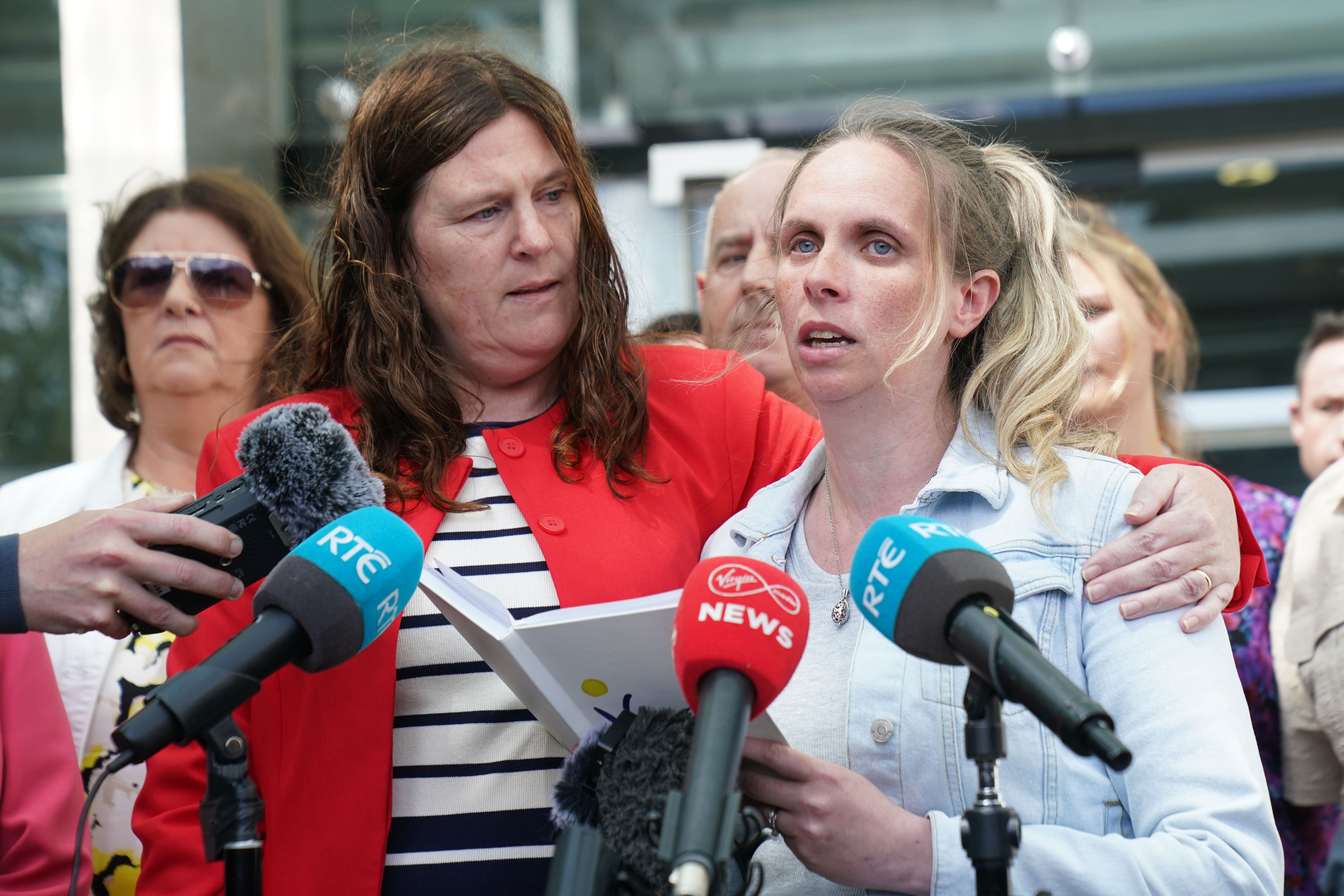 Outside the Central Criminal Court in Dublin, Loren Howard (left) and Sara Howard, Tina Santchwell's family members,
