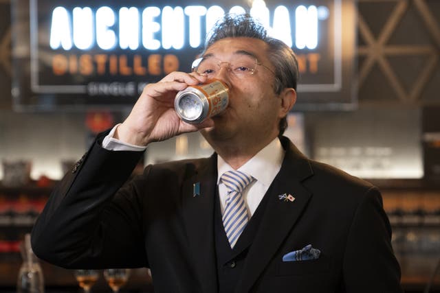 <p>The Japanese Ambassador to the UK Hiroshi Suzuki took a large gulp of 1901 Irn Bru recipe</p>