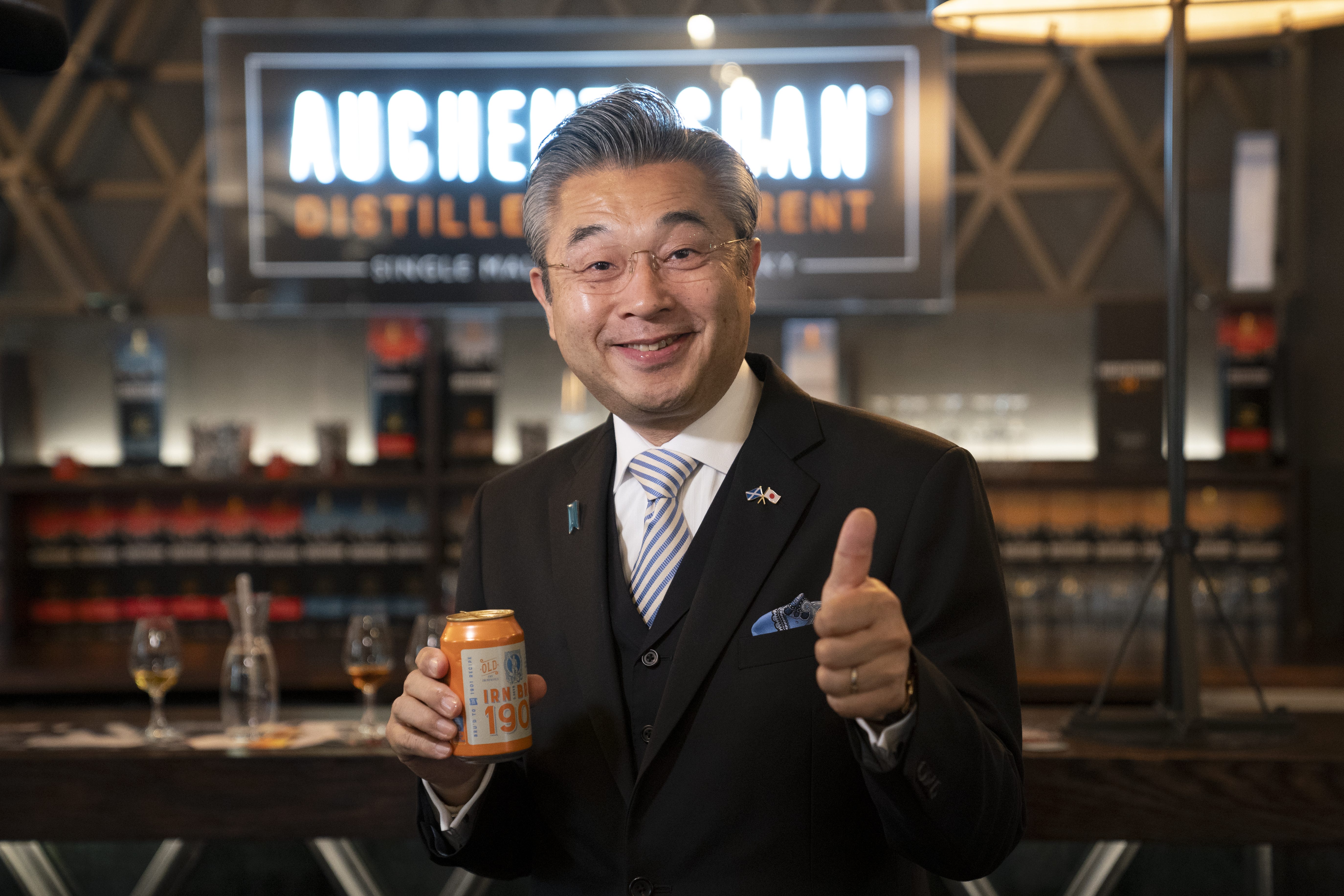 The Japanese Ambassador to the UK, Hiroshi Suzuki, tastes some ‘original recipe’ Irn-Bru during a visit to the Auchentoshan Distillery in West Dunbartonshire (Jane Barlow/PA)