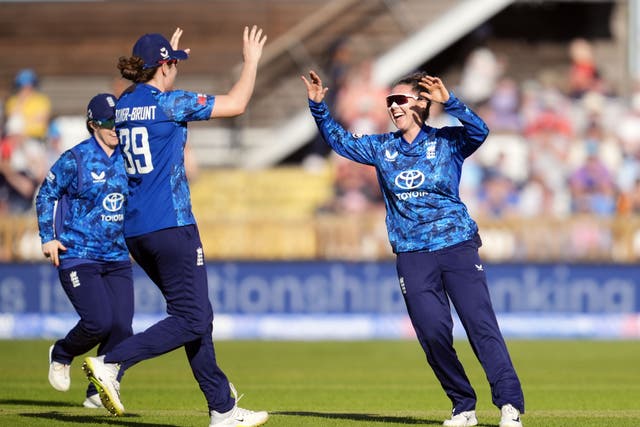 Linsey Smith (right) claimed five wickets on her England one-day international debut (Nick Potts/PA)