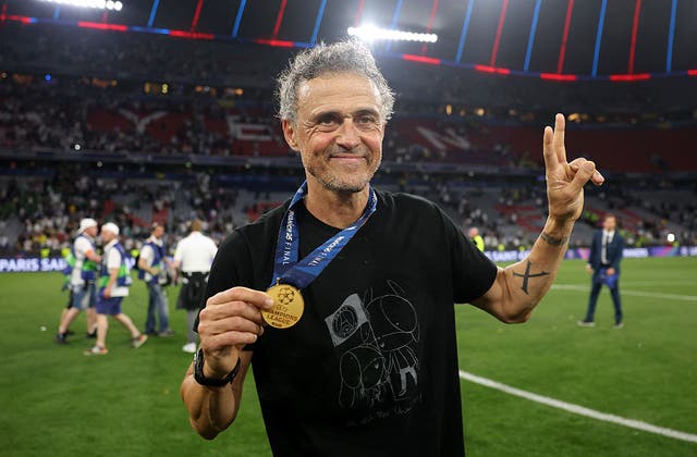 <p>Luis Enrique wearing the Xana foundation t-shirt after the Champions League final</p>
