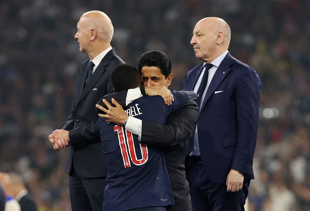 Nasser Al-Khelaifi hugs PSG’s Presnel Kimpembe