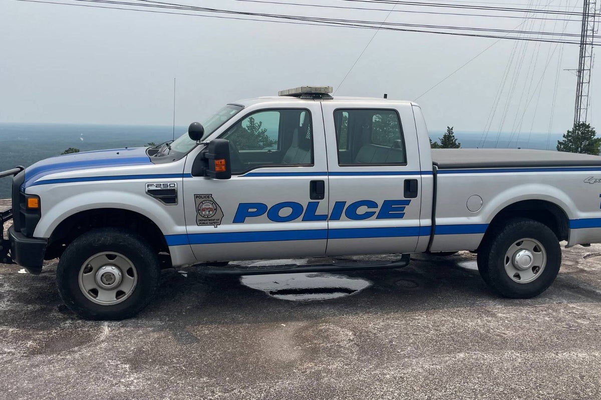 Hiker finds burned body near top of popular Georgia tourist attraction Hiker finds burned body near top of popular Georgia tourist attraction