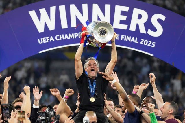 <p>Luis Enrique was hoisted high on the shoulders of the PSG squad after Champions League triumph</p>
