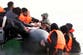 Smuggler boats pick up Channel migrants ‘like taxi service’ while French police stand by, minister fumes
