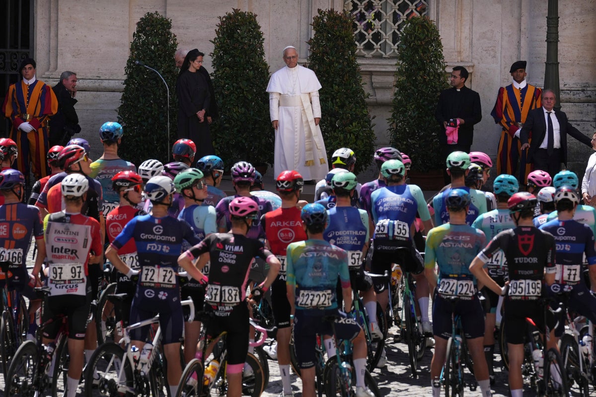 Pope Leo XIV blesses cyclists competing in the Giro d'Italia as final stage enters Vatican gardens