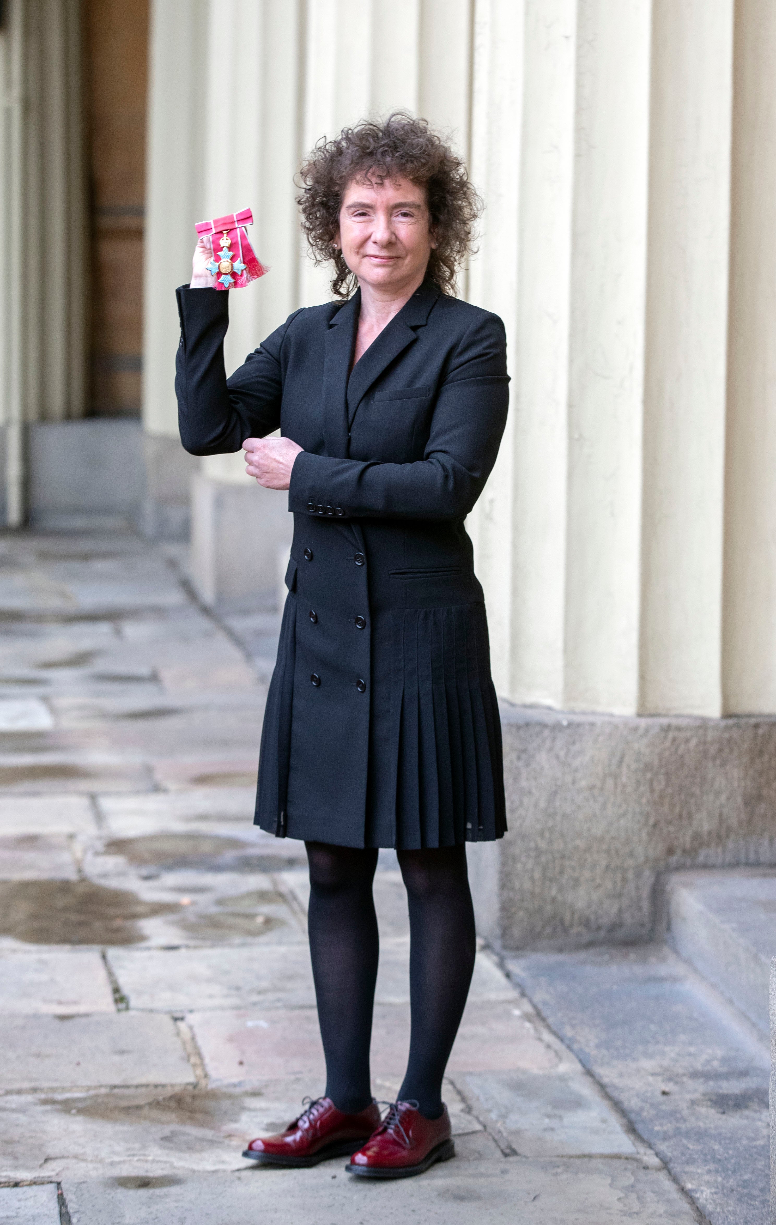 Jeanette Winterson leaves Buckingham Palace after receiving her CBE in 2018