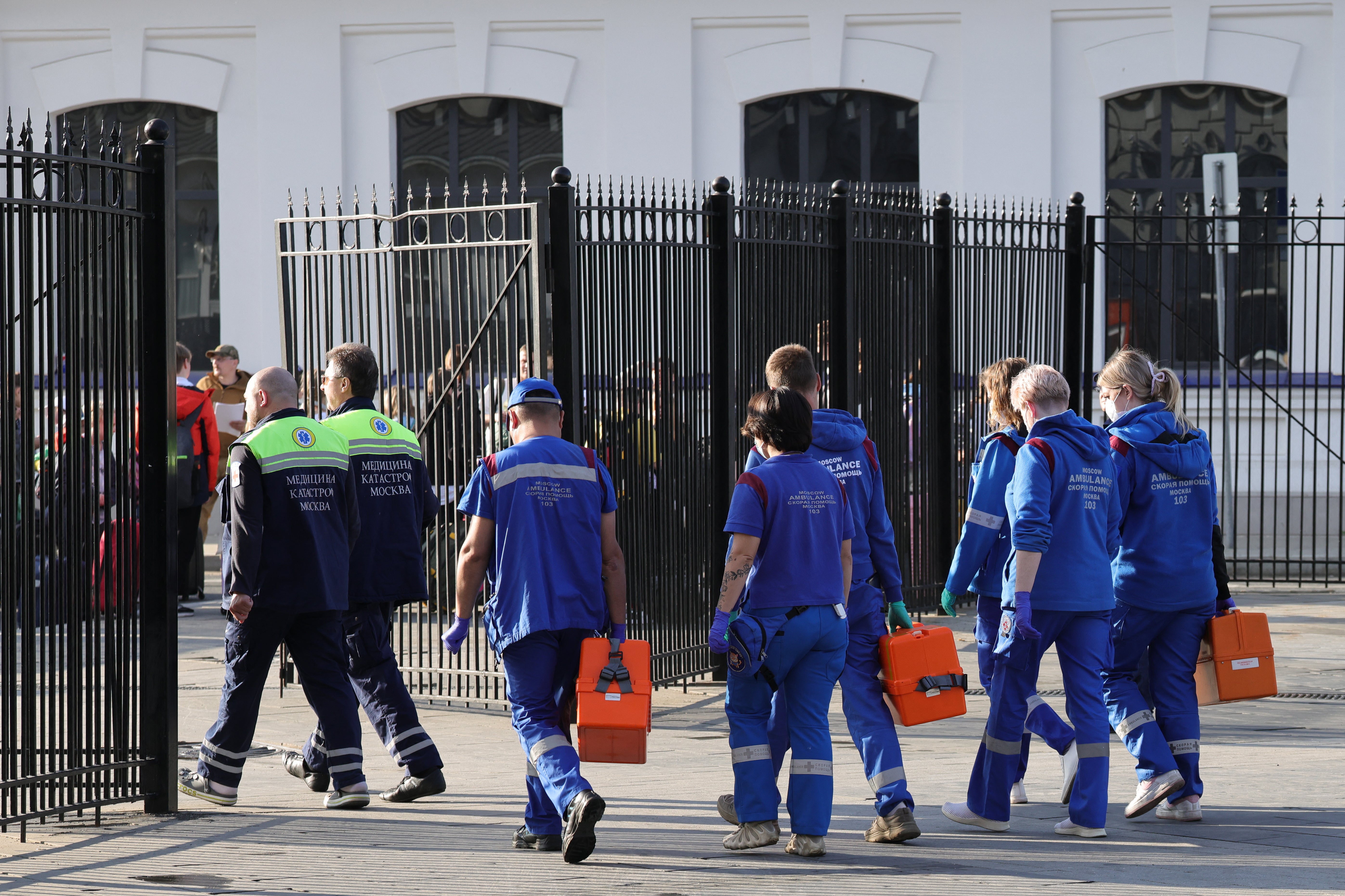 Russian medics gather at Kievsky railway station in Moscow on Sunday prior to the arrival of injured passengers following the bridge collapse in the Bryansk region